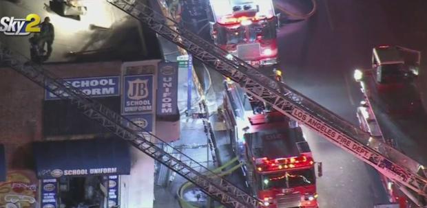 Rubbish Fire Spreads To Strip Mall In Downtown LA 
