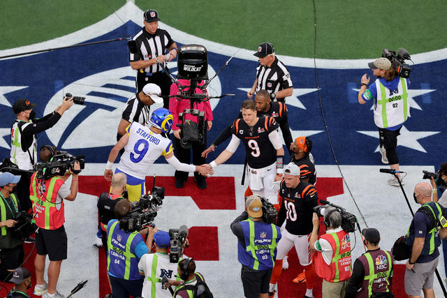 Matthew Stafford of the Los Angeles Rams hands the Vince Lombardi News  Photo - Getty Images