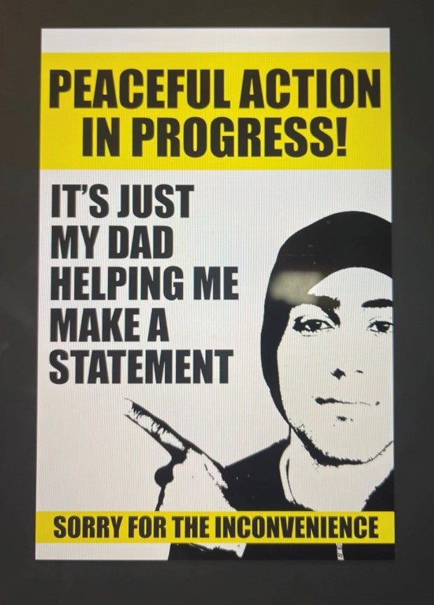 Joaquin Oliver poster at bottom of crane 