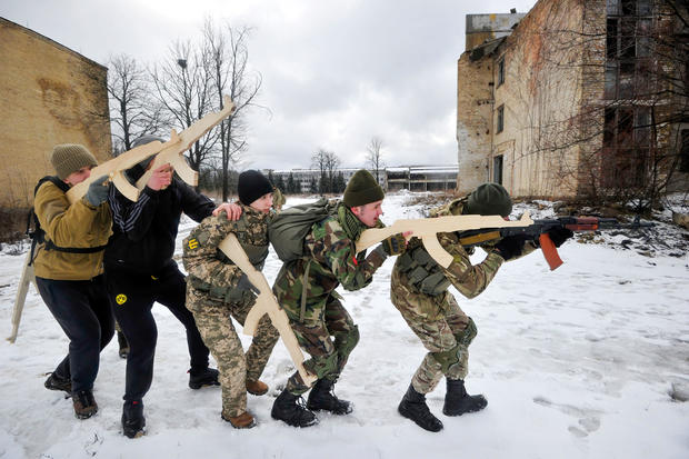 Ukrainians attend an open military training for civilians 