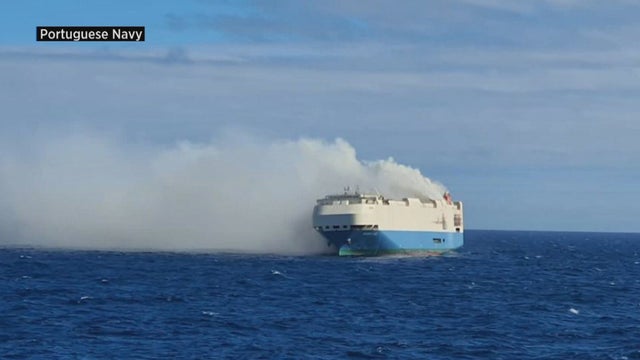 vo-burning-cargo-ship-at-sea.jpg 