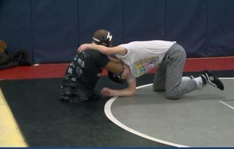 Born without legs, Adonis Lattimore wins state wrestling championship