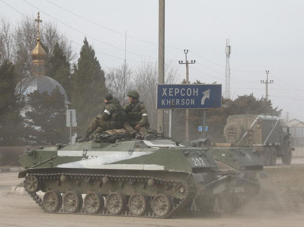 Russian Army military vehicle drives along a street in Armyansk 