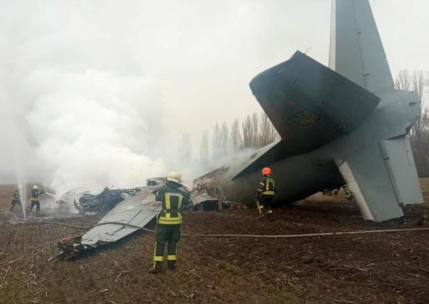 Rescuers work at the crash site of the Ukrainian Armed Forces' Antonov aircraft in Kyiv region 