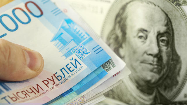 dollars and rubles. concept of currency exchange. Economic crisis, decline of the world economy. Ruble devaluation. The fall of the Russian currency. Currency exchange at the Bank. 
