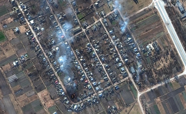 02-closer-view-of-burning-homes-and-impact-craters-in-field-rivnopillya-ukraine-28feb2022-wv2.jpg 