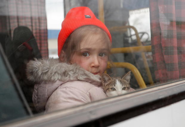 Evacuees from Mariupol are seen at a camp in Bezymennoye 