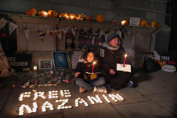 Richard Ratcliffe and daughter Gabriella hold a candlelit vigil 