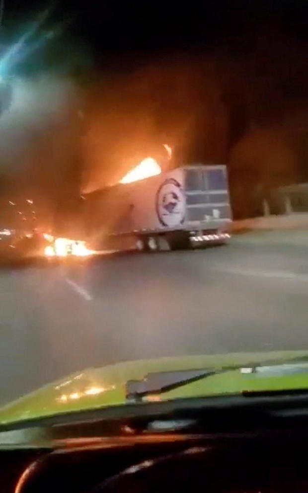 Truck is seen set ablaze following the arrest of a gang leader, in Nuevo Laredo 