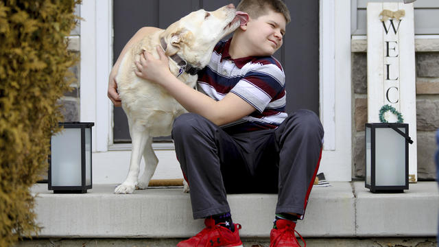 Photo of Nolan Balcitis with his dog 