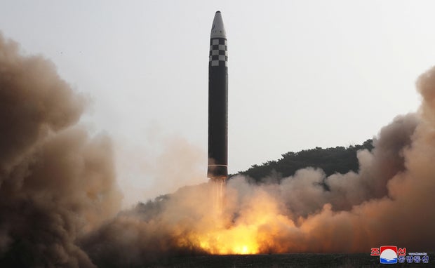 General view during the test firing of what state media report is a North Korean "new type" of intercontinental ballistic missile (ICBM)
