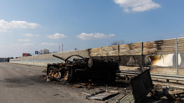 A destroyed Russian T-72 battle tank on the highway in Kyiv 