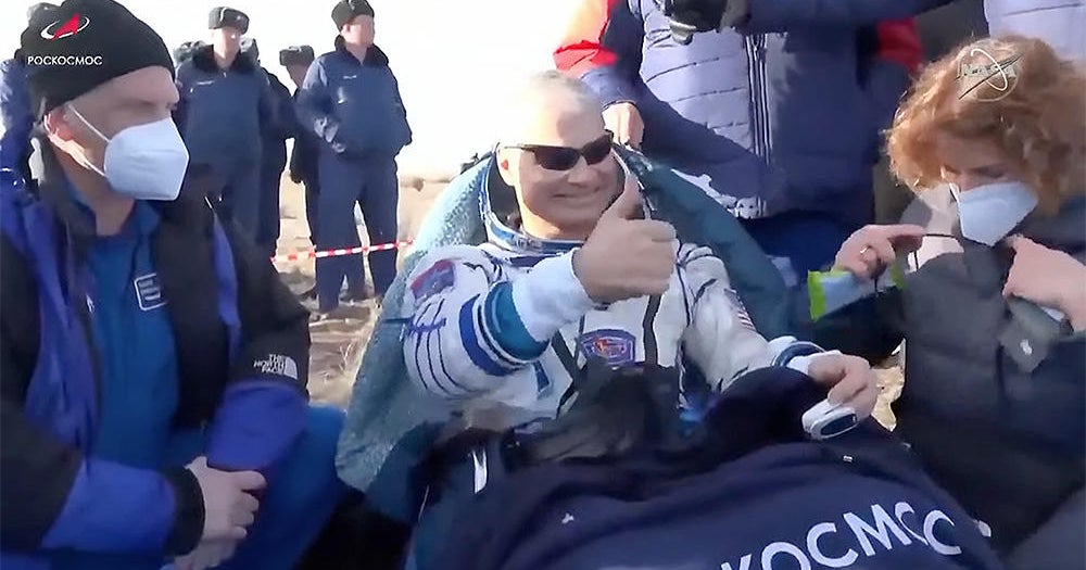 NASA astronaut and cosmonaut crewmate complete 355-day spaceflight