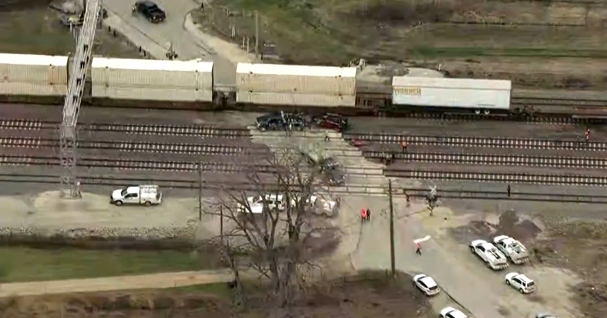 Man dead after freight train hits vehicle in Will County - CBS Chicago