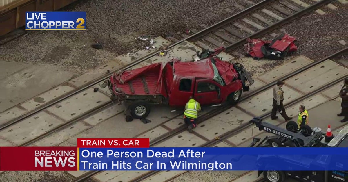 One person dead after train hits pickup truck in Will County - CBS Chicago