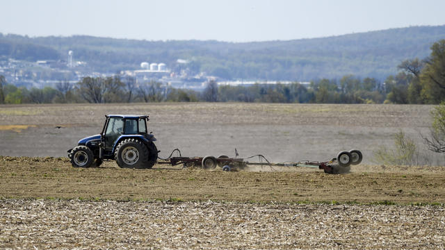 Farm Field Being Plowed At Start Of Growing Season In Pennsylvania 