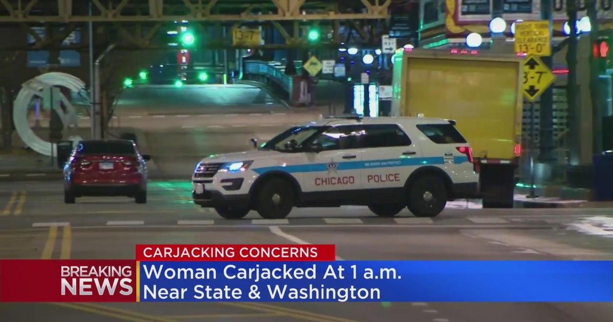 Woman carjacking while stopped at red light in The Loop - CBS Chicago