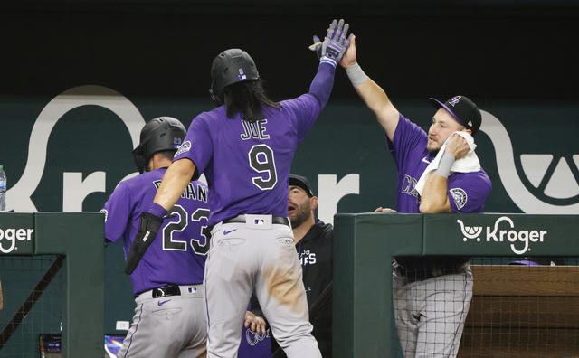 Randal Grichuk takes a homer away from Corey Seager 