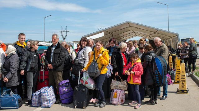 Ukrainian Refugees At The Local Bus Station 
