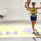 Runners cross the finish line of the 126th Boston Marathon in Boston 