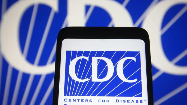 In this photo illustration the Center for Disease Control 