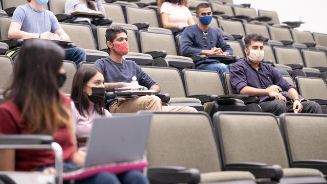 Multi ethnic university students in lecture hall 