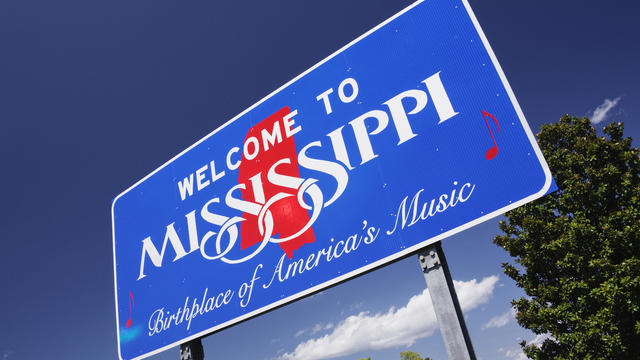 Low angle view of Welcome to Mississippi sign, Natchez, Mississippi, United States 