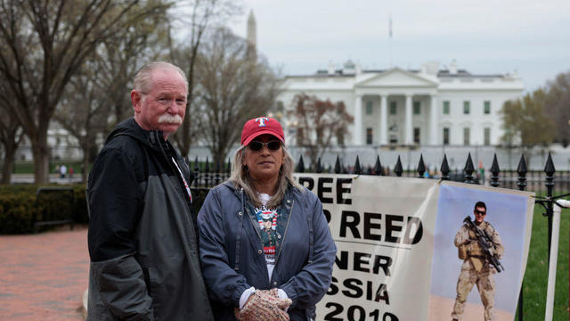 Parents Of Marine Being Held In Russia Protest Outside White House 