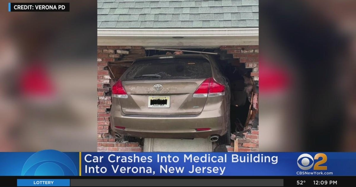 Car slams into medical building - CBS New York