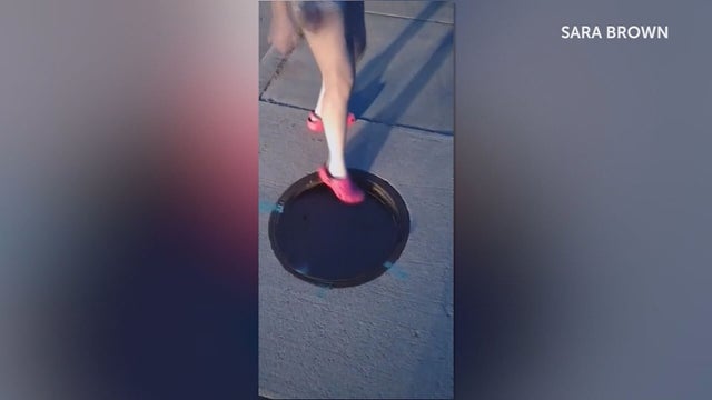 WOMAN-FALLS-THROUGH-MANHOLE-63VO.transfer_frame_278.jpeg 