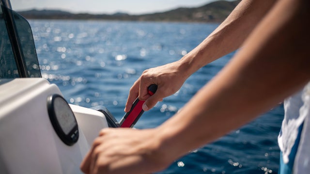 Man driving a boat 