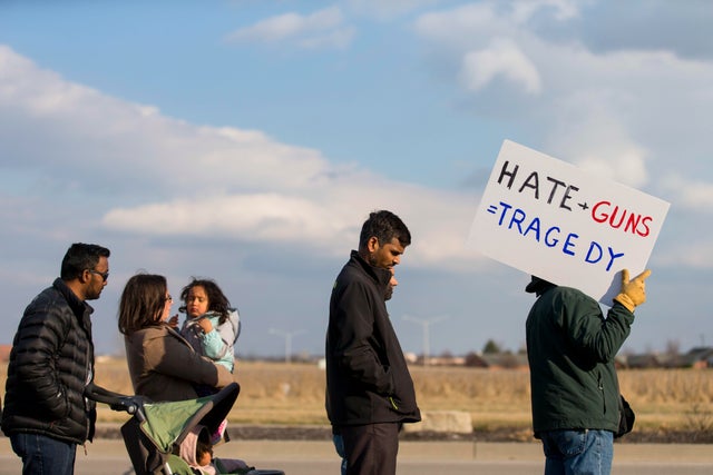 Peace March And Vigil Held For Olathe Bar Shooting Victims 