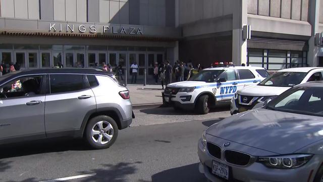 Police outside Kings Plaza Shopping Center in Brooklyn on June 4, 2022, after someone set off fireworks inside 