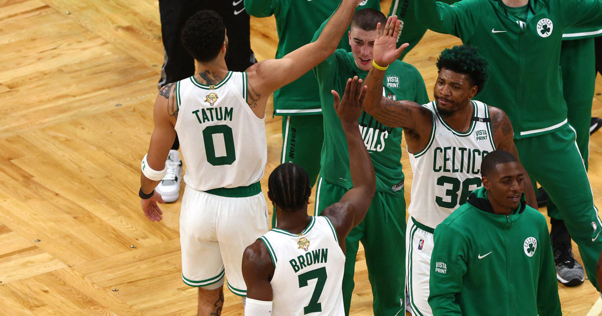 Best Celtics Moments- Tatum and Brown greeting the bench during a timeout.