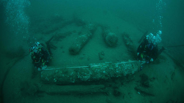 brothers-measuring-cannon3-c-norfolk-historic-shipwrecks.jpg 