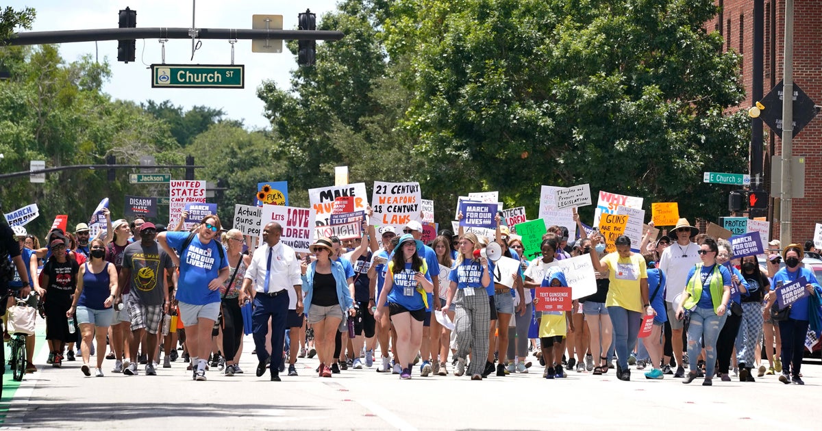 Thousands take to streets around the nation demanding action on gun laws