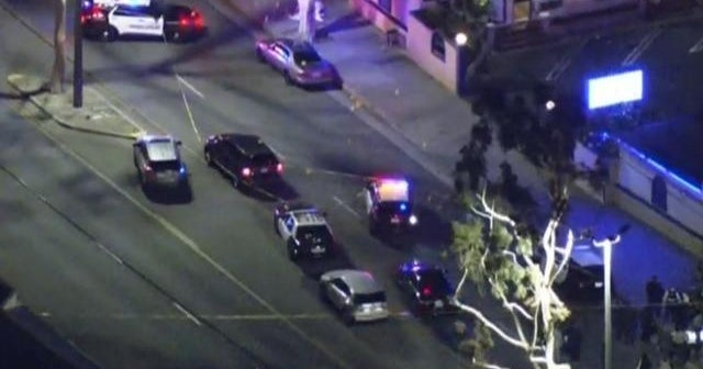 2 California officers killed in shootout at motel - CBS News