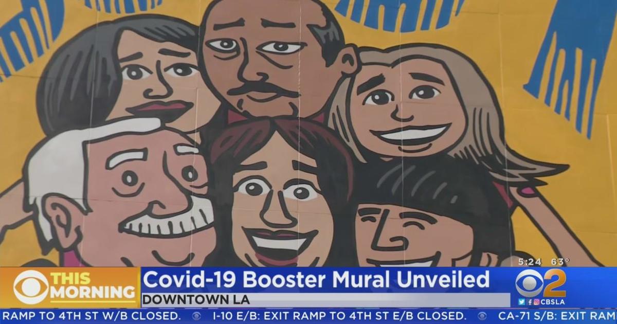 Giant mural urges Latinos to get their families boosted