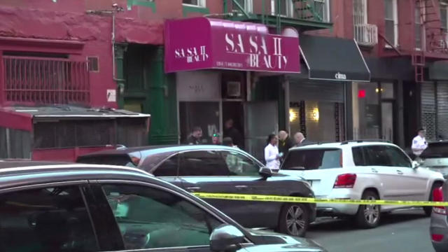 Police tape outside a Lower East Side salon 
