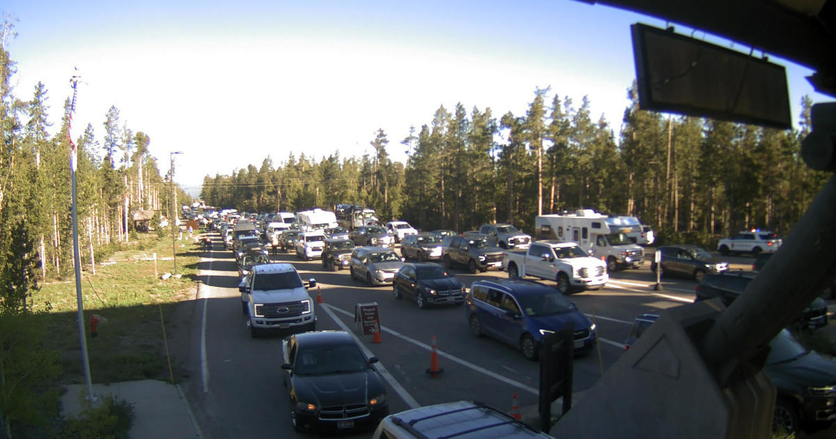 Hundreds of cars parked outside Yellowstone as park reopens after historic flood