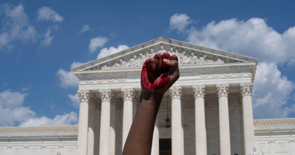 Off-duty Rhode Island police officer suspended for allegedly punching woman at abortion protest