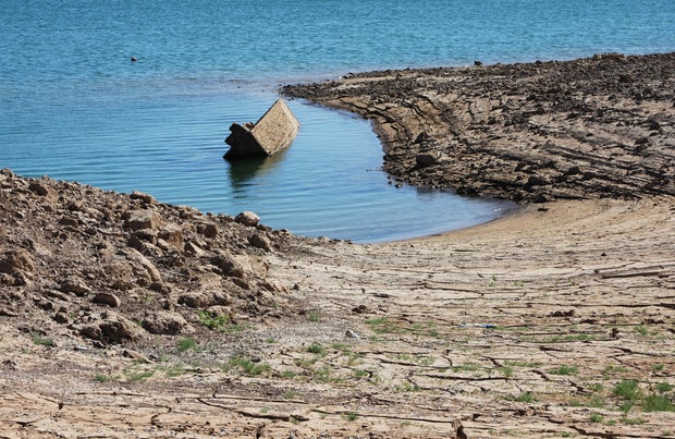 World War II-Era Boat Now Visible In Lake Mead, As Its Water Level Continues To Recede 