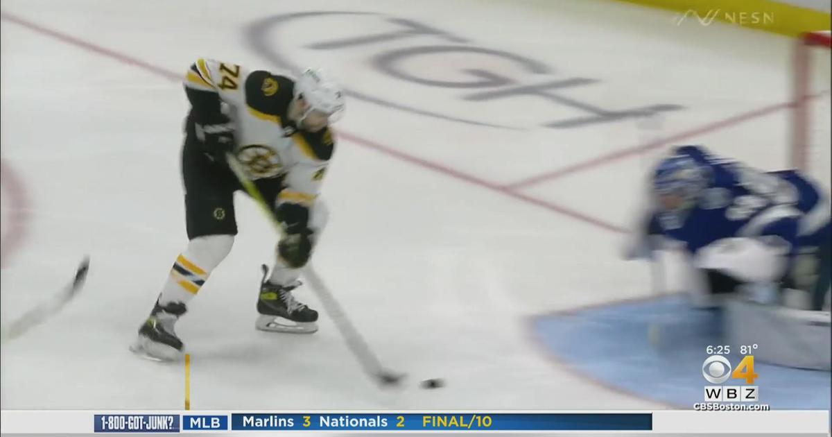 Jake DeBrusk reacts to hand-pass call that negated Carlo's goal in