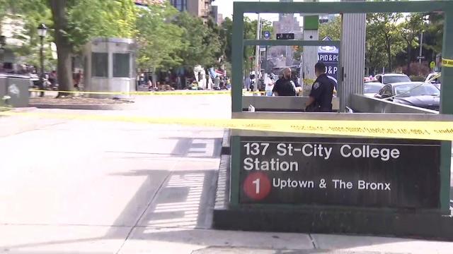 Police tape blocks off the entrance to the 137 St.-City College subway station. 