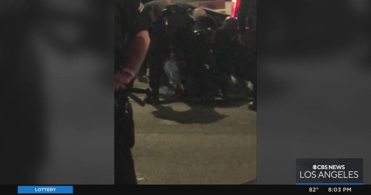 Call for action after LAPD officer seen kicking handcuffed Black man ...