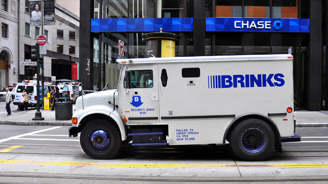 A Brink's armored truck stops at an intersection in San Francisco's Financial District on Sept. 30, 2013. 