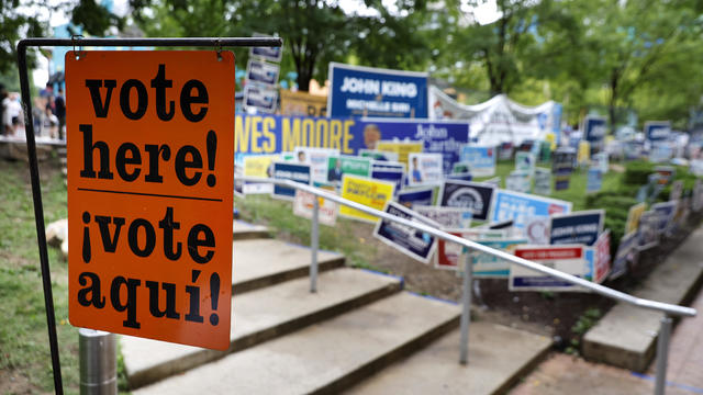 Candidates Campaign Near Polling Places As Early Voting Begins In Maryland 