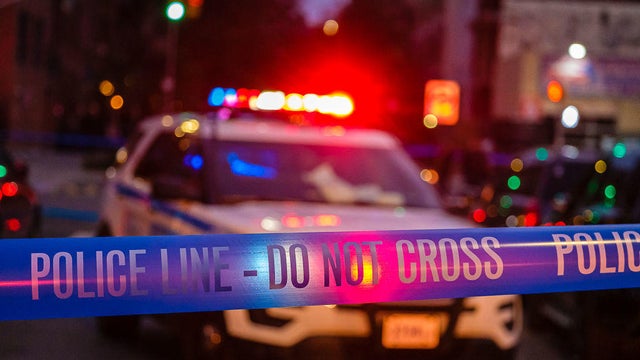 Police investigate on McGuinness Boulevard. 