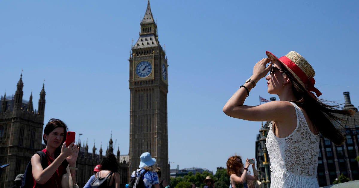 Britain bakes as heat wave brings record high temperatures and fuels