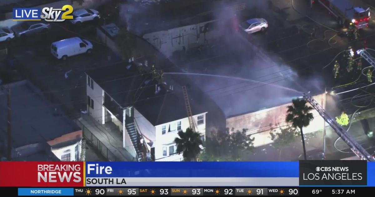 Firefighters engage fire at commercial building in South LA - CBS Los ...